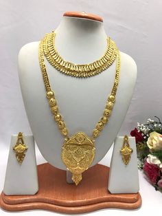 Handmade Indian Jewelry Asian Wedding Bridal Jewellery Party Ethnic Wear 22ct Gold Plated Bridal Necklace Set Rani Haar Bridal Jewellery Set  PLEASE NOTE, This Item Is Not Real Gold .Only Good Quality Gold Plated Jewellery .it is Artificial jewellery. It is a perfect match with formal attire on special occasions or with casual wearing.  Slight Colour variations possible due to difference in screen and photograph Care instructions Keep Jewellery away from direct heat, water, perfumes, deodorants 22k Gold Bridal Necklace For Puja, Gold Bridal Sets With Chandbali Latkans, Gold Bollywood Bridal Sets, 22k Gold Jewelry With Zari Work, Gold Bridal Sets With Zari Work For Wedding, Gold Jewelry Sets For Puja And Festivals, Bollywood Gold Jewelry Sets For Puja, Gold Jewelry Sets With Tilla For Festivals, Bollywood Style Gold Jewelry Sets For Puja