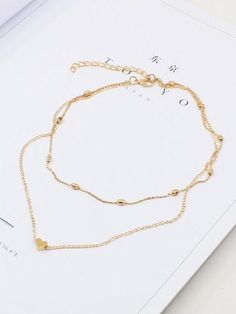 Sku CY-!19645 Material Alloy Occasion Going out , Casual , Vacation , Bohemia , Beach Seasons Spring , Summer , Autumn , Winter Type Necklaces Accessories Color SILVER,GOLD Size FREE SIZE Size chart: Please consult the size chart we provide for this item's measurements to help you decide which size to buy. Trendy Gold Charm Necklaces For Valentine's Day, Trendy Gold Heart Necklace, Valentine's Day Gold Alloy Necklaces, Valentine's Day Gold Alloy Necklace, Gold Heart Beads Choker Necklace, Minimalist Gold Alloy Charm Necklaces, Trendy Gold Necklaces For Valentine's Day, Trendy Gold Alloy Charm Necklace, Gold Minimalist Charm Necklace