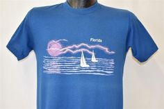 80s Florida Sailing Lightning Tourist t-shirt Small Graphic Print Crew Neck T-shirt For Sailing, Summer Boating T-shirt With Short Sleeves, Summer Short Sleeve T-shirt For Boating, Cotton Graphic Print Tops For Sailing, Casual Summer Tops For Sailing, Crew Neck Graphic T-shirt For Sailing, Crew Neck T-shirt With Graphic Print For Sailing, Crew Neck Graphic Print Top For Sailing, Summer Boating T-shirt With Crew Neck