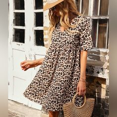 Nwt Leopard Print Smock Dress. Short Sleeve. Flared Dress. Size ~ S/4 Bust ~ 37.8” L ~ 35” Relaxed Fit Smock Dress For Day Out, Casual Smock Dress With Relaxed Fit, Knee-length Smock Midi Dress, Knee-length Smocked Midi Dress, Casual V-neck Smock Midi Dress, Casual V-neck Smock Dress, Casual V-neck Smocked Mini Dress, Smock Midi Dress For Day Out, Fall Smock Dress With Short Sleeves