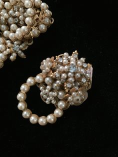 A Robert Demario brooch abd earrings circa 1960 in mint condition. brooch measures 3.25x3.25 in. Earrings measure 2 in by 1.5 in. all sales final. beautiful pearls and rhinestones. Costume Jewelry Brooch For Evening, Evening Costume Jewelry Brooch, Clip-on Costume Jewelry For Vintage Events, Wedding Costume Jewelry Brooches With Matching Earrings, Mid-century Brooch Jewelry For Party, Mid-century Party Brooch Jewelry, Vintage Brooch Jewelry For Evening, Vintage Brooch For Evening, Mid-century Gold Jewelry For Wedding