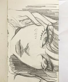 a drawing of a woman's face with her eyes closed