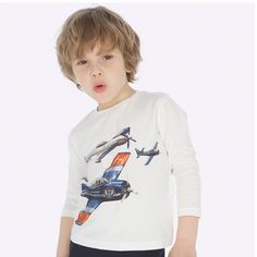 Mayoral Long Sleeve T-Shirt Size: 2t Color: White, Multi New With Tags Cotton Long Sleeve T-Shirt With Airplane Print On The Front And Back. Mayoral Is A Spanish Children’s Clothing Company Known For Its Quality & Traditional But Trendy Design. So Well Made! A Favorite Brand For Our Little One. Casual Cartoon Print Tops For Playtime, Casual Tops With Cartoon Print For Playtime, Casual Graphic Print Tops For Playtime, White Cotton Tops With Cartoon Print, Casual Long Sleeve T-shirt For Playtime, White Character Print Top For Spring, White Crew Neck T-shirt For Playtime, Playful White Tops With Character Print, White Tops With Character Print For Spring