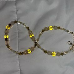 Handmade Clear Beaded Bracelets As Gift, Spiritual Beaded Clear Jewelry, Yellow Beaded Jewelry For Healing, Spiritual Clear Beaded Jewelry, Spiritual Hand-strung Jewelry For Party, Handmade Clear Beaded Round Bracelets, Clear Round Beads Jewelry For Gifts, Clear Round Beads Jewelry Gift, Spiritual Yellow Jewelry With Gold Beads