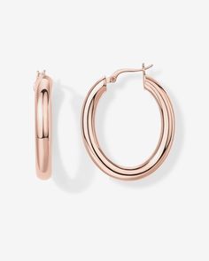 With an elongated sleek silhouette, these hoops are a must-have for the modern woman. Throw them on with a sundress in the summer, or turtleneck and updo in the winter, and look effortlessly chic. 925 Sterling Silver post14KT yellow, rose or white gold platedMeasurements: Width: 25mm (.98”); Height: 30mm (1.12”) Chunky Jewelry, Toggle Bracelet, Beaded Anklets, Bracelet Collection, Chain Earrings, In The Winter, Yellow Rose, Pearl Jewelry, Modern Woman