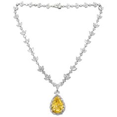 Platinum diamond necklace with GIA certified center 35.31 fancy intense vivd yellow vs2 pear shape, GIA#2145952743 set in platinum handmade necklace, features 47.00ct of outside diamonds D/E/F VVS-VS quality. Plus center 1.50ct pear e vs1 GIA#24155411814 Yellow Diamond Jewelry, Most Expensive Jewelry, Expensive Necklaces, Yellow Diamond Necklace, Drop Necklaces, Diamond Pendant Sets, Yellow Diamonds, Yellow Jewelry, Diamond Necklace Set