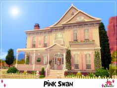 the pink swan house is located in front of a white picket fence