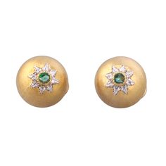 Pair of 18k gold Macri earrings by Buccellati, with emeralds. DESIGNER: Buccellati MATERIAL: 18k Gold GEMSTONES: Emerald DIMENSIONS: Earrings are 15mm in diameter. MARKED/TESTED: Buccellati, Italy, 750. WEIGHT: 13.3 grams CONDITION: Previously Owned/ Excellent Condition Formal Yellow Gold Diamond And Emerald Earrings, Gold Emerald Earrings With Brilliant Cut, Shell Clothes, Emerald Gold Earrings, Buccellati Bracelet, Buccellati Earrings, Buccellati Jewelry, Jewelry Dress, Clothes Summer