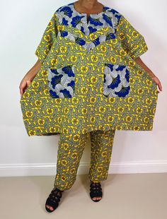 This two piece Ankara is great for any occasion, very stylish, perfect for the girl who wants to turn heads. Elastic waistband  Top length 37" Inseam 29" 100% Cotton Cotton Patchwork Sets For Loungewear, Blue Cotton Patchwork Sets, Cotton Sets With Elastic Waistband And Short Sleeves, Multicolor Short Sleeve Matching Pant Set, Multicolor Matching Pant Set, Multicolor Matching Short Sleeve Pant Set, Multicolor Cotton Patchwork Sets, Cotton Two-piece Set With Short Sleeve, Multicolor Cotton Sets With Long Pants