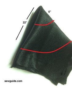 a black cloth with red stitching on it and measurements for the bottom half of the fabric