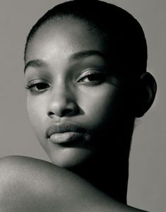 a black and white photo of a woman's face