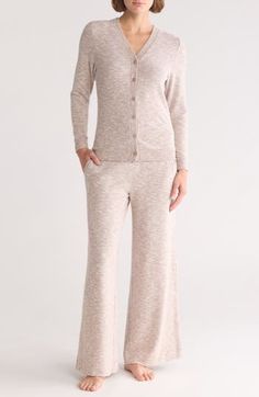 A cozy cardi tops these ultrasoft hacci pajamas paired with wide-leg pants held up by a comfy smocked waist. 22" top length; 27 1/2" inseam; 28" leg opening; 13" front rise; 16" back rise (size Medium) Cardigan has front button closure; V-neck; long sleeves with ribbed cuffs Pants have elastic waist; side-seam pockets 65% polyester, 31% rayon, 4% spandex Machine wash, dry flat Imported Beige Fall Sleepwear For Lounging, Comfortable Beige Sleepwear For Loungewear, Cozy Beige Sleepwear For Relaxation, Soft Touch Tops For Loungewear, Beige Long Sleeve Sleepwear For Fall, Casual Fall Sleepwear For Loungewear, Beige Winter Sleepwear For Loungewear, Casual Soft Touch Sleepwear For Loungewear, Neutral Soft Knit Tops For Loungewear