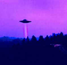 an alien flying in the sky over a forest under a purple hued sky with trees