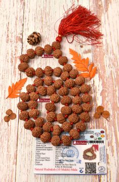 Product Name : ShriRudram 10 Mukhi Rudraksha Mala / Ten Face Rudraksh Rosary Java 54+1 Beads Lab Certified 14-16 MM Origin : Java Bead Size : 14 - 16 MM Total Beads : 54 + 1 = 55 Rosary Length : 27 Inches around the Neck. Attachment : Rosary Will be Shipped Along with its Lab Certificate Spiritual Mala With Polished Beads For Festive Occasions, Festive Spiritual Mala With Polished Beads, Multicolor Temple Jewelry Mala For Puja, Diwali Puja Polished Beaded Necklaces, Diwali Puja Beaded Necklaces With Polished Beads, Traditional Beads For Rituals And Festivals, Handmade Beaded Necklaces For Diwali Puja, Handmade Beaded Necklaces For Puja Festivals, Festival Mala With Polished Round Beads