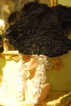 Black tricorn hat with plumes, richly decorated. Complete your dress with this wool hat, created in our Atelier in Venice. Our tricorn-hats are made of wool and metal and are costumized according to your size. They match perfectly with wigs. (However you can wear them also without wig.) All our hats are hand made and hand-decorated in our Atelier. This hat has been decorated with feathers, Swarovski crystals, trimming, lace. Size: please, choose the measure of the circumference of your head. Als Elegant Black Ceremonial Costume Hats And Headpieces, Elegant Black Costume Hat, Elegant Black Hat For Costume, High Crown Hats For Carnival Costume, Curved Brim Costume Hat For Carnival, Curved Brim Carnival Costume Hat, Curved Brim Hats For Carnival Costume, Elegant Hats For Costume Party And Carnival, Elegant Hats For Carnival Costume Party