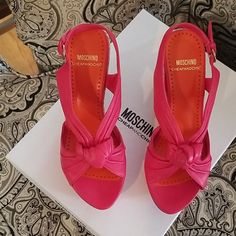 Moschino Pink Leather Sandles Made In Spain In Original Box Beautiful Condition Worn A Handful Of Times Designer Pink Leather Sandals, Pink Leather Sandals With Padded Heel, Pink Leather Sandals For Party, Pink Leather Sandals For Evening, Spring Party Heels With Leather Lining, Pink Sandals With Red Sole And Round Toe, Pink Sandals With Red Sole, Pink Sandals With Round Toe, Pink Leather Sole Party Sandals