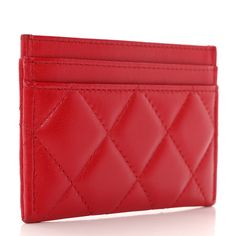 This is an authentic CHANEL Lambskin Quilted Resin CC Heart Card Holder in Red. This stylish holder is crafted of luxurious red diamond quilted lambskin leather with a resin heart with a gold Chanel CC logo. The exterior features three card slots with a main compartment in the center with a red fabric interior. Chanel 19, Heart Card, Gold Chanel, Red Diamond, Heart Cards, Diamond Quilt, Cc Logo, Red Fabric, Love Cards