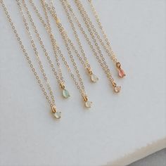 "Ultra Tiny Pendant Necklace Add a touch of sparkle with our dainty pendant necklace. This necklace is the chic and minimalist! D E T A I L S -TINY teardrop approx. 6mm or round drop 4mm -Sparkling crystal in mint, smoky white or coral pink -High quality 14kt gold filled delicate link necklace -spring ring closure. LENGTH -Measures 16 inches with a 2 inch extender for a total length of 18 inches. -You can wear this at 16 inches or 18 inches. -Also available in 16, 18 or 20 inches with no extende Tiny Pendant Necklace, Dainty Pendant Necklace, Tiny Pendant, Dainty Pendant, Gem Necklace, Layered Jewelry, Birthday Jewelry Gift, Necklace Dainty, Sparkling Crystal