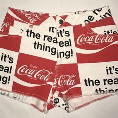 Coca Cola Shorts Red & White Logo Retro White Short Bottoms, White Letter Print Bottoms For Beach, White Letter Print Bottoms For Beach Season, Red Graphic Print Shorts For Summer, Red Graphic Print Summer Shorts, Retro White Shorts For Spring, White Retro Shorts For Spring, Beach Graphic Print Cotton Bottoms, White Graphic Print Beach Bottoms