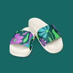 Step into comfort and style with these women's slides, perfect for the Phish festival or any casual occasion. Featuring a vibrant retro floral pattern in mondegreen colors, these slides are designed to offer both comfort and a touch of whimsy. Ideal for Phish fans who want to showcase their style while enjoying their favorite music. Lightweight and versatile, these slides are a must-have for any festival-goer or anyone who loves unique, eye-catching footwear. * Cushioned and durable faux leather Casual Green Slip-on Slides, Comfortable Green Slide Slippers, Multicolor Slip-on Slides For Summer, Comfortable Multicolor Slide Sandals, Green Synthetic Slides, Comfortable Green Open Toe Slides, Green Slip-on Summer Flip Flops, Green Cushioned Slip-on Slides, Green Casual Beach Slides