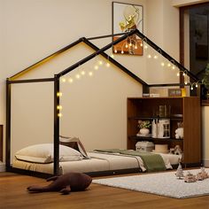 a room with a bed and some lights on the ceiling, in front of a bookshelf