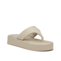 Steve Madden-Getable Platform Flip Flop Classic sandals are a staple piece for the warm weather seasons. The Steve Madden Getable platform flip flops feature the casual silhouette but are upgraded by the chunky style, supportive footbed, and padded straps. Synthetic Toe Post Platform Slippers With Textured Footbed, Trendy Toe Post Sandals With Cushioned Footbed, Platform Sandals With Single Toe Strap, Trendy Sandals With Textured Footbed And Toe Post, Trendy Sandals With Thick Eva Bottom, Trendy Eva Sandals With Thick Bottom, Synthetic Platform Sandals With Single Toe Strap, Comfortable Synthetic Toe Post Footbed Sandals, Synthetic Toe Post Footbed Sandals With Textured Footbed