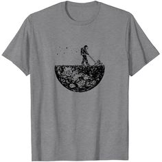 a t - shirt with an image of a man walking on the moon