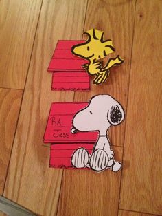 an image of a snoopy sticker on the floor with peanuts door decals