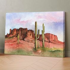 watercolor painting of desert scene with cactus and mountains