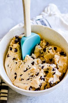 a bowl filled with ice cream and chocolate chips