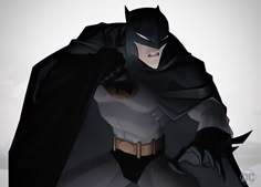 the animated batman is standing with his cape open