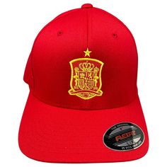 a red hat with a yellow crest on it