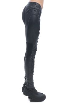 Comfortable form fitted leggings that are flattering to the female form. Dimensional sculpted shapes create figure enhancing, body sculpted forms. It can be worn to elevate any outfit through fantasy, embracing futuristic and otherworldly fashion forms. Comfortable fit through body sculpted patterning and stretch fabric Soft leather outer and smooth rayon jersey lining Back lined with stretch waxed spandex for a body formed fit with maximum maneuverability Quality YKK back zipper Dimensional modular shapes and textures Innovate Sculptural designS - Size Fitted Thigh-high Cosplay Leggings, Fitted Thigh High Leggings For Cosplay, Thigh High Fitted Leggings For Cosplay, Fang Grillz, Silver Grillz, Custom Grillz, Gold Grillz, Fashion Forms, Body Form