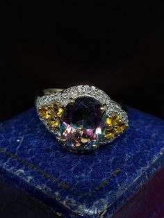 Here we have a stunning cocktail ring featuring sparkling natural multi gemstones including a central mystic topaz with citrines and diamond set in 9ct yellow gold.  UK size - P US size - 7.75 Message me any questions  ITEM - S1928 Etsy Gold Ring, Mystic Topaz, Diamond Set, Yellow Gold Ring, Cocktail Ring, Cocktail Rings, Yellow Gold Rings, Rings Statement, Wedding Shop