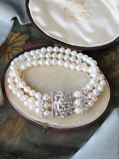 Statement bridal bracelet composed of freshwater pearls & flawless diamonds | wedding inspo, 2024 wedding, 2024 bride, bridal accessories, wedding accessories, bridal headpieces, headpieces for brides, bridal tiara, bridal crown, tiaras and crowns, headpieces for brides, luxury jewelry, diamond crown, bridal hair ideas, sparkly tiaras, sparkly wedding tiara, diamond tiara,elegant wedding, bridal bracelet, wedding bracelet, pearl accessories, pearl bracelet #bridetobe #wedding #weddinghair Classic Glamour, Bridal Jewelry Vintage, Flawless Diamond, Freshwater Pearl Bracelet, Wedding Bridal Jewellery, Bridal Bracelet, Bridal Tiara, Statement Bracelet, Bridal Pearls