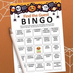 a halloween themed printable game for kids to play on the table with pumpkins and ghost