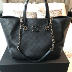 Large Chanel Shopping Bag In Great Condition. Luxury Shopping Bag With Handles, High-end Black Bag With Removable Pouch, Designer Everyday Luxury Bag With Handles, High-end Tote Bag With Branded Hardware, High-end Everyday Luxury Tote Shoulder Bag, High-end Luxury Tote Bag, High-end Black Shopping Bags, High-end Black Bags With Branded Hardware, Designer Black Bag With Detachable Handle