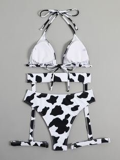 Are you a woman who loves trendy and cool apparel? Then, this bathing suit is a perfect choice. With its push-up support and fashionable halter design, you'll feel confident and stylish. Made from soft polyester, it guarantees comfort. Featuring a trendy cow print pattern, this high-waisted swimwear is ideal for women. Grab yours now before it's gone!Specifications bikini : underwire bikini bikini: swimwear women bathing suit women: transparent bikini With Pad: Yes Waist: High Waist Support Type: Wire Free Style: Elegant fashion Pattern Type: Solid,Print,Dot,LEOPARD Origin: Mainland China Model Number: 206 print WOMEN Bikini SET Material: Polyester Item Type: Bikinis Set Gender: WOMEN Fit: Fits true to size, take your normal size Elegant Fashion: Office Lady CN: Liaoning Brand Name: Gerald Cow Print Clothes Fashion, Cow Costume Women's Cow Crop Top, Cow Bathing Suit, 3 Piece Swimsuit, Cow Print Swimwear, Zebra Print Swimsuit, Halter Bathing Suit, Women Bathing, Swimwear High Waisted