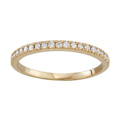 a yellow gold wedding band with white diamonds