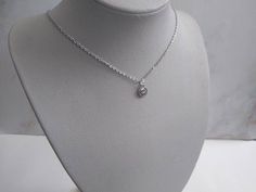 "This is a tiny silver yin yang charm necklace made with a stainless steel chain. It is a short 14\"/16\"/18\" \"choker\" like layering necklace meant to be the 1st layer, or layer closest to the throat *Message For Custom Orders*" Yin Yang Charm, Choker Style, Ying Yang, Layering Necklace, Steel Chain, Yin Yang, Stainless Steel Chain, Layered Necklaces, Custom Orders