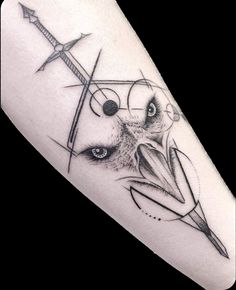 a black and white photo of a tattoo with an arrow on the side of it