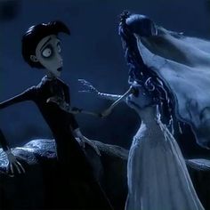 the corpse bride is being held by an evil man in a white dress with long black hair