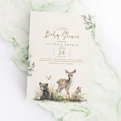 a baby shower is shown with animals on it