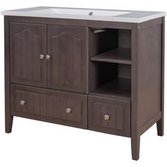 a bathroom vanity with two drawers and a white counter top on the bottom, in dark brown