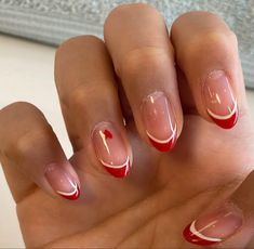 Celebrate the holiday season in style with these cute Christmas nails and designs, including festive nail art ideas that you can DIY at home! French Manicure With Red Line, Two Tone Red French Tip Nails, Red French Tip Nails With White Line, Coffin Shape Nails Christmas, White And Red French Nails, White French Tip With Red Line, Red French Tip With White Line, Cute Basic Christmas Nails, Super Simple Christmas Nails