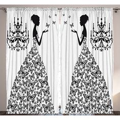 two curtains with black and white silhouettes of women holding chandeliers in front of them