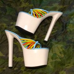 Temptation White Platform Heels With Light Blue Footbed And Multicolor Stone Straps. The Toe Straps Are Light Blue, Yellow, Orange, And Bright Green. Very Tropical Colors! There Are Just A Couple Of Minor Flaws - A Scuff On One Of The Heels That May Be Able To Be Removed. There Is Also A Scuff In The Footbed Of One Shoe - Obviously Not Noticeable When They’re On The Feet. Never Worn Out, Only Worn For Studio Photo Shoot. Platform Is 3.5 Inches In Height And Heel Is 7.5 Inches In Height. Rainbow Open Toe Synthetic Heels, Multicolor Open Heel Platform Heels, Colorful Synthetic Heels With Round Toe, Colorful Round Toe Synthetic Heels, Multicolor Platform Heels, Rainbow Platform Heels With Round Toe, Rainbow Open Toe Platform Heels, Rainbow Round Toe Platform Heels, Colorful High Heel Synthetic Heels