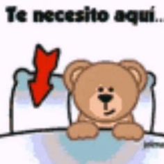 a brown teddy bear sitting on top of a white bed next to a red arrow