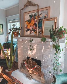 a living room filled with furniture and a fire place covered in plants next to a fireplace