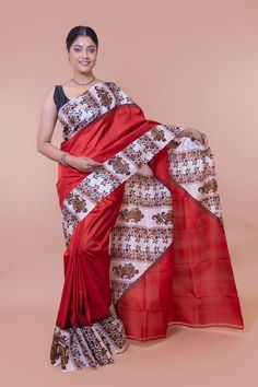 Paisley on the Kalka motif is one of the most iconic impressions from the Indian subcontinent. This classic red silk saree has hand-block printed work throughout the body. It has been done this way to honor the beautiful Kalka impression. It is a perfect party wear and wedding wear saree. However, you can wear it on almost any occasion. This red pattu saree is a complete head-turner. The saree brings out the lady in you effortlessly. So, it is a must-have saree for your wardrobe. A work of art We're blessed with a group of talented artisans who do the unthinkable. Their skill, hard work, creativity and patience are top-notch. The important reason behind its popularity is its versatility. Silk is a versatile fabric. It is a natural protein fabric, and there are many variants of silk- hence Red Tussar Silk Pre-draped Saree With Motifs, Bollywood Style Red Pre-draped Saree With Printed Border, Red Cotton Silk Pre-draped Saree For Puja, Red Tussar Silk Pre-draped Saree For Festivals, Red Block Print Traditional Wear For Festive Occasions, Red Block Print Traditional Wear For Navratri, Festive Red Traditional Wear With Block Print, Red Silk Pre-draped Saree For Traditional Ceremonies, Festive Red Block Print Traditional Wear